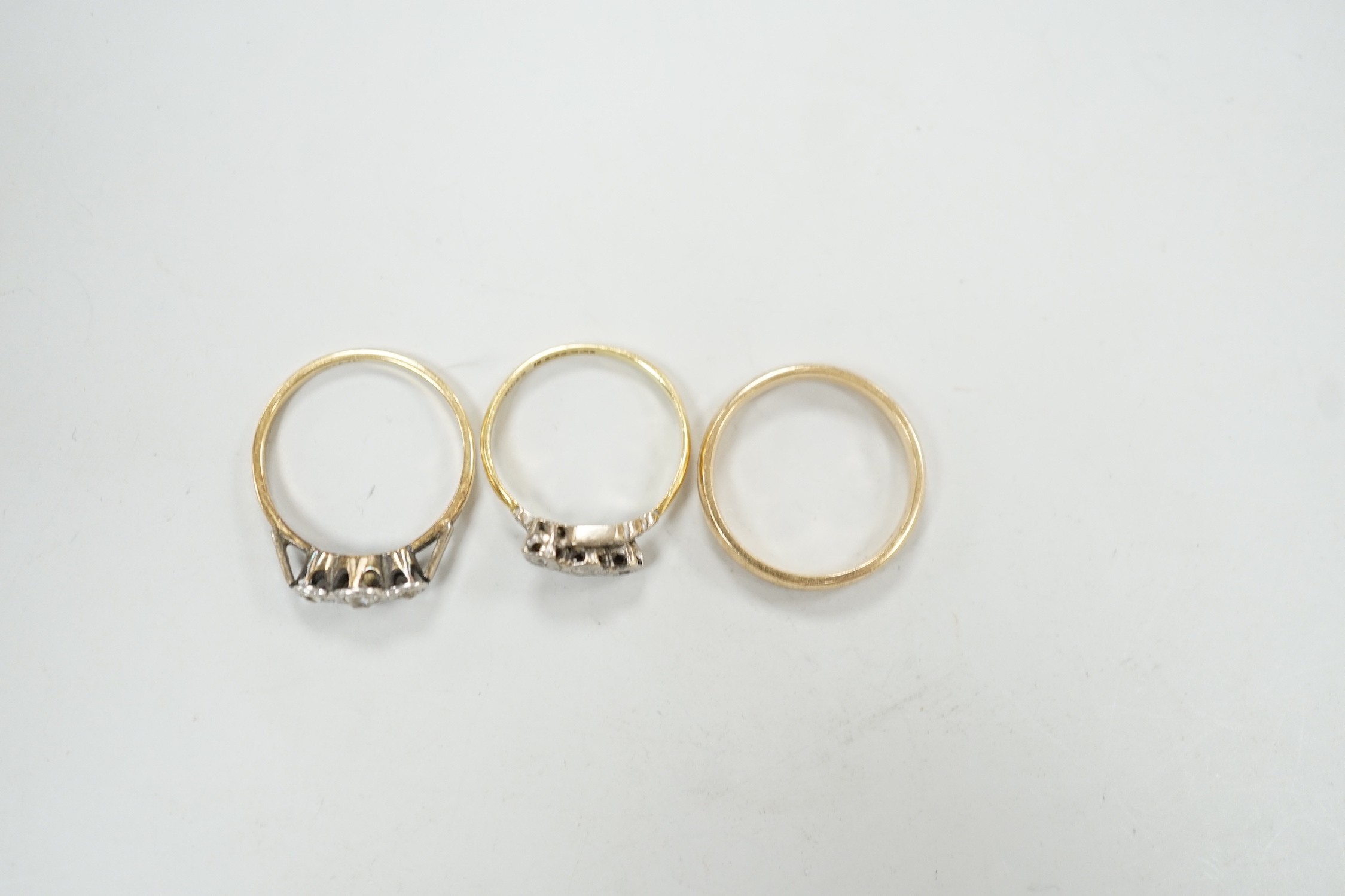 A 9ct gold wedding band, size O/P, 3 grams and two 1940's 18ct and illusion set diamond chip rings, gross 4.4 grams.